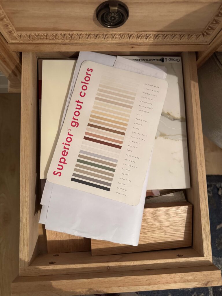 grout color sample leaflet in a drawer