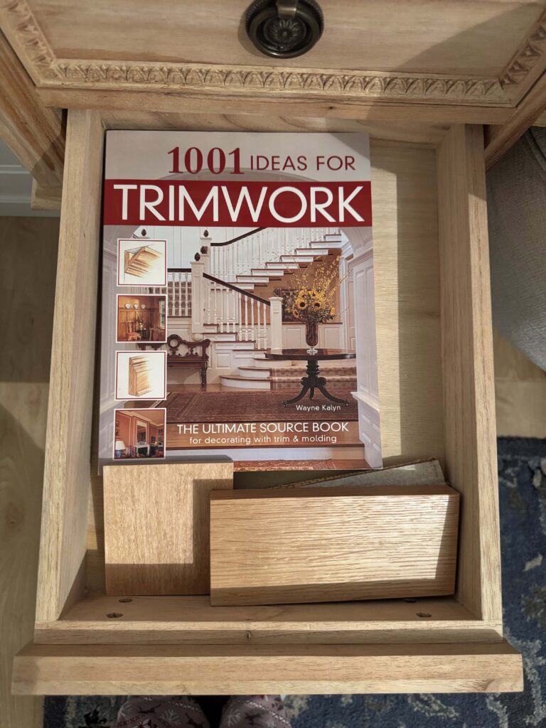 wood stain color samples and book in a drawer